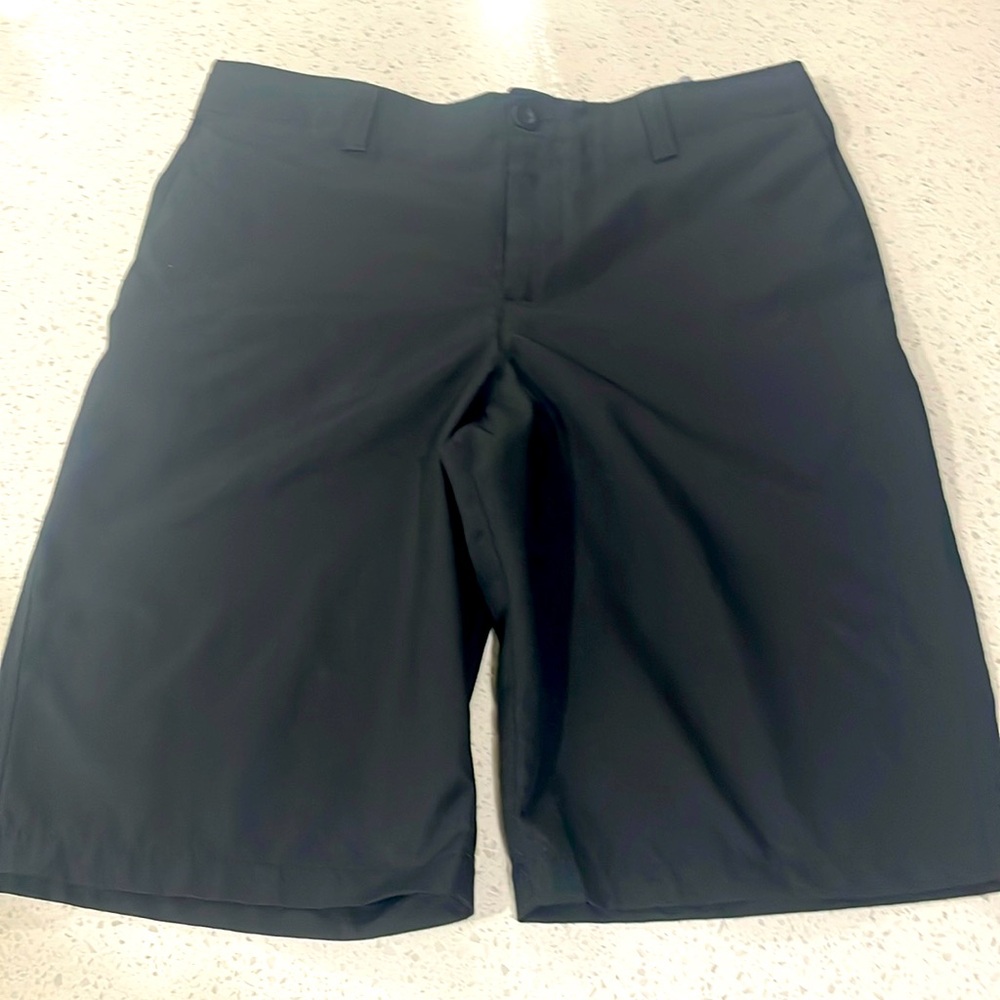 Boys black Under Armour golf shorts. Size 16. Like new.
